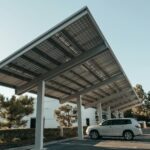 Solar panel carport in a modern urban setting, showcasing clean energy solutions.